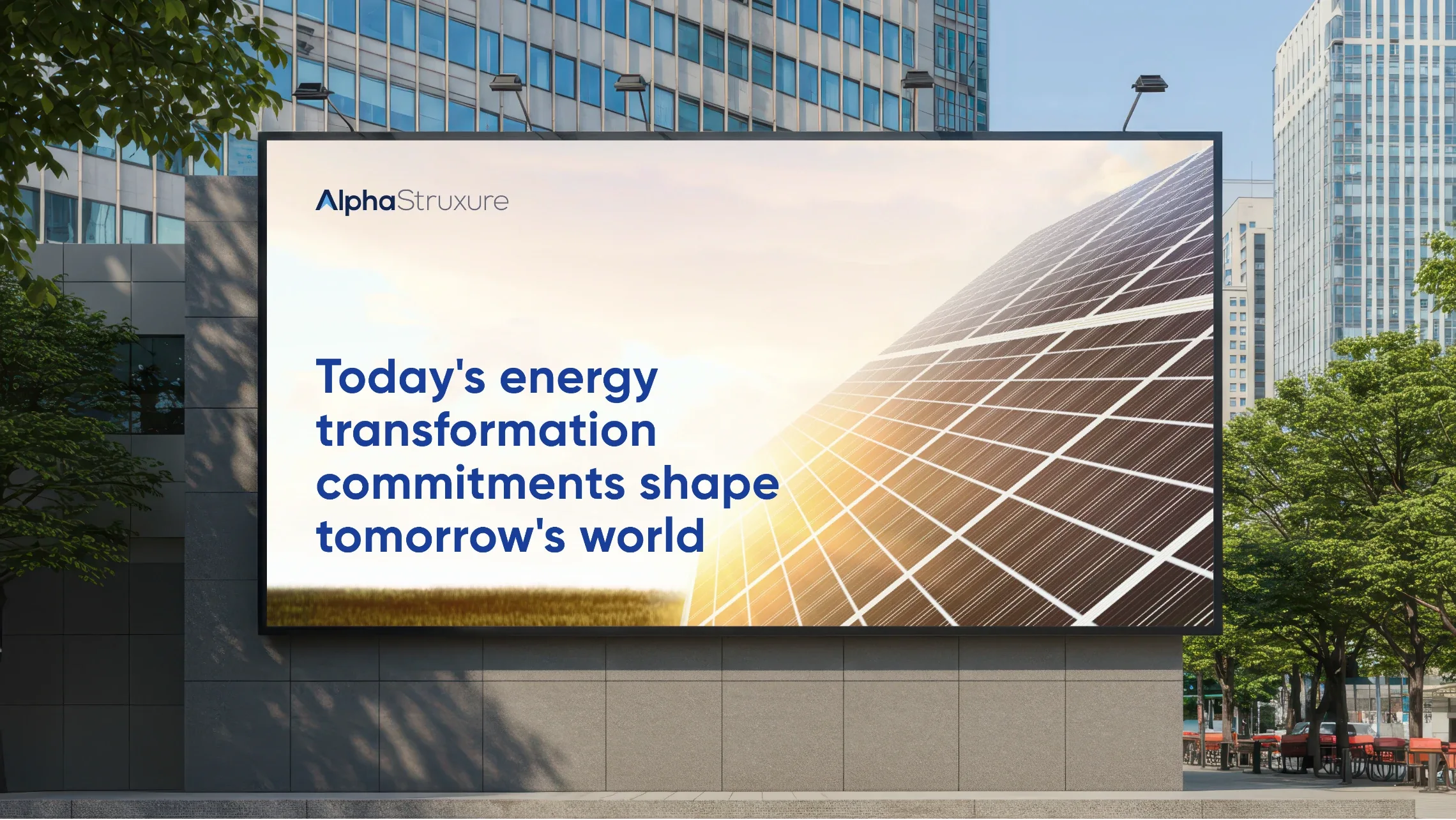 AlphaStruxure billboard reading “Today’s energy transformation commitments shape tomorrow’s world” beside solar panels