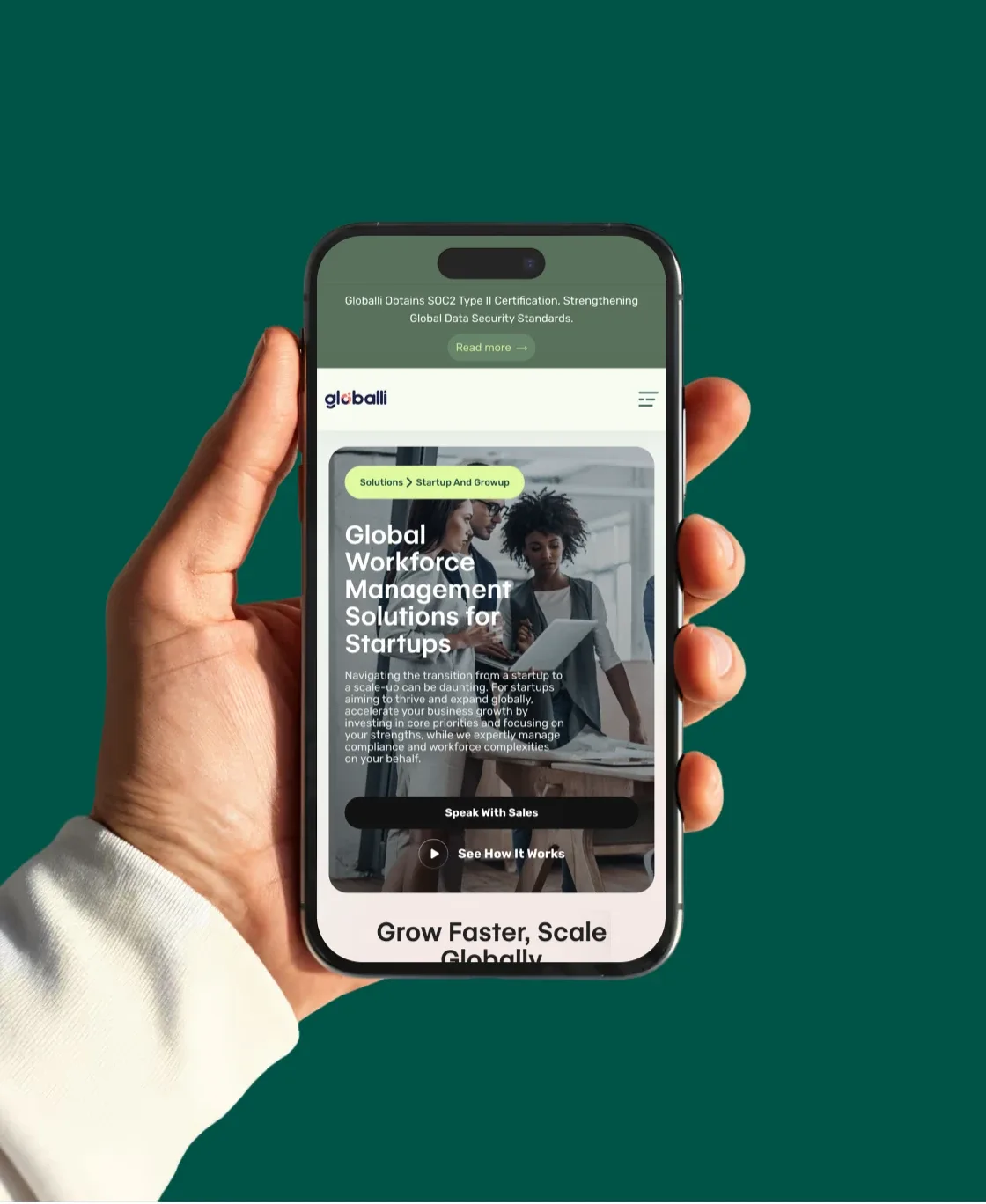 Hand holding a phone with the Globalli global workforce management page