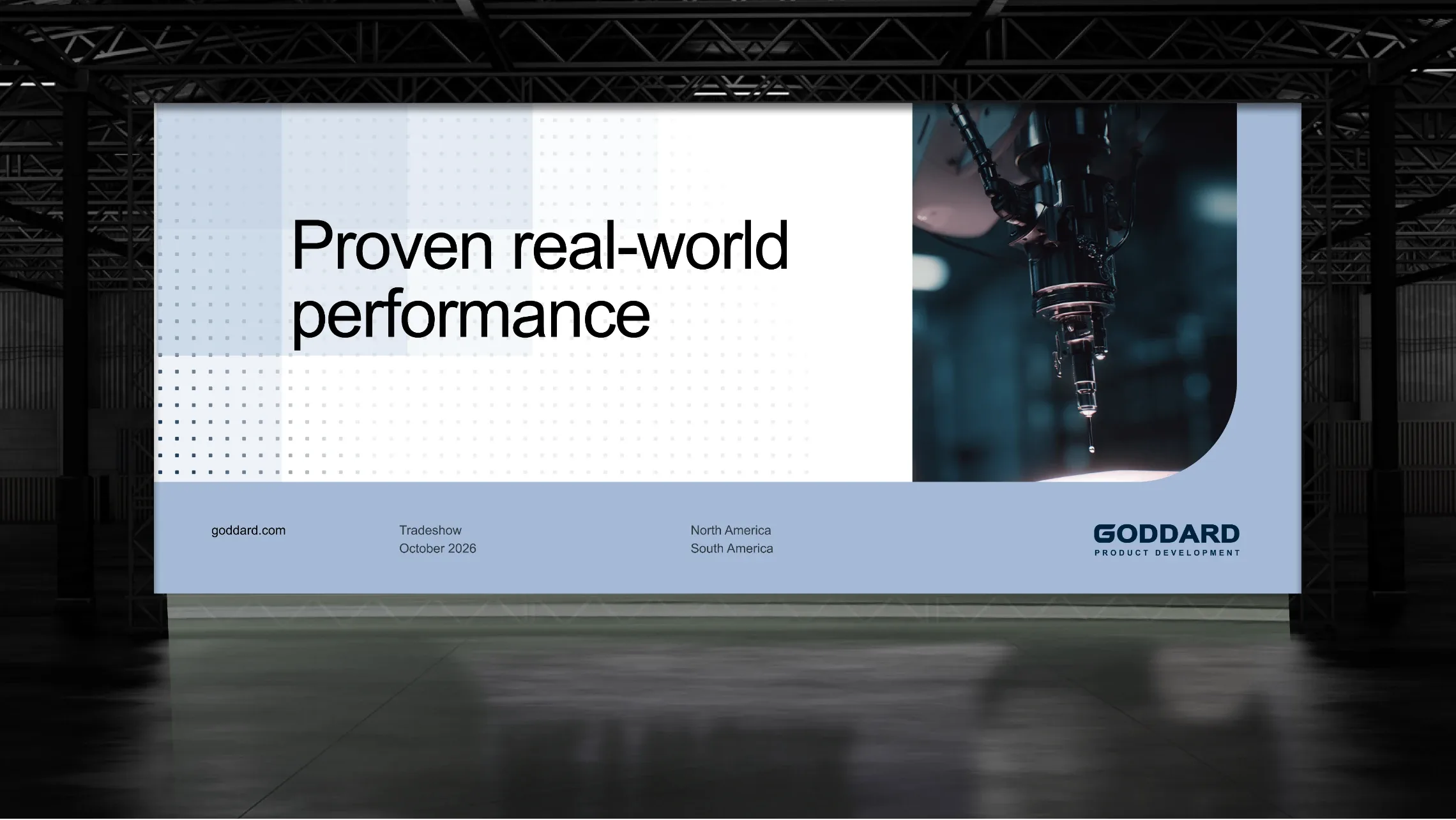 Goddard billboard reading “Proven real-world performance” with a robotic arm