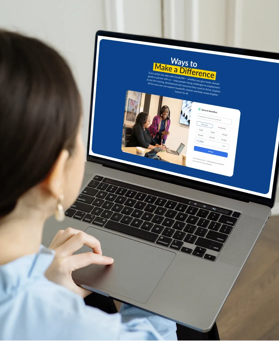 Person viewing the Goodwill “Ways to make a difference” page on a laptop
