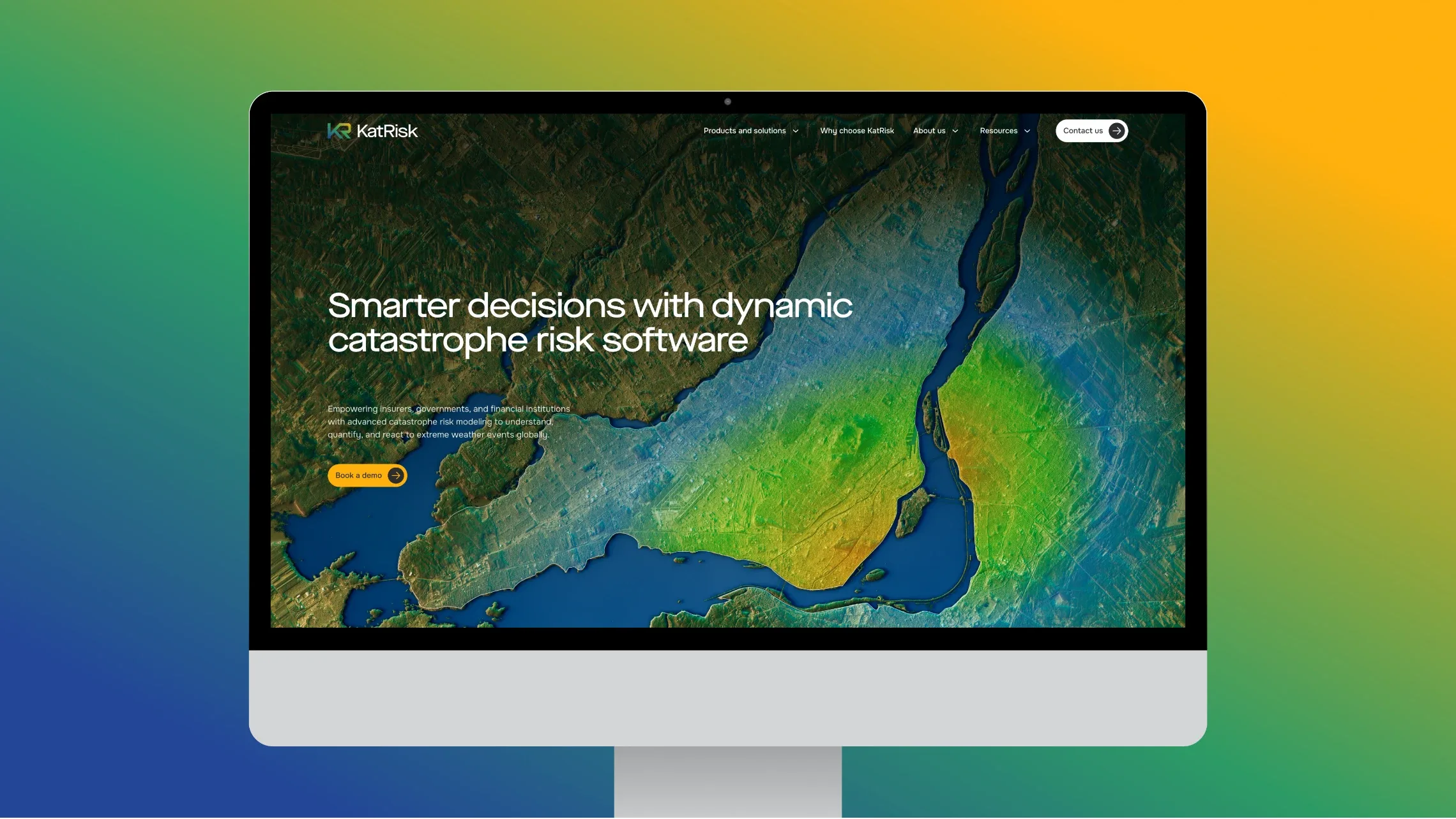 KatRisk homepage, “Smarter decisions with dynamic catastrophe risk software”, on a desktop monitor