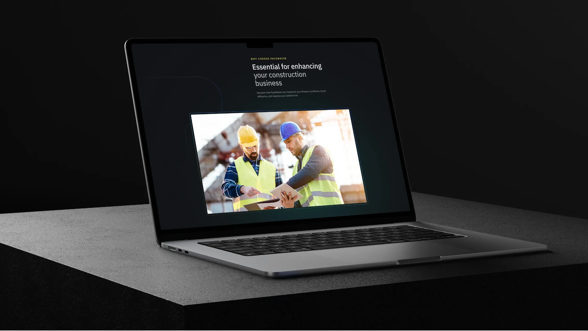 PayeWaive website on a laptop on a dark surface
