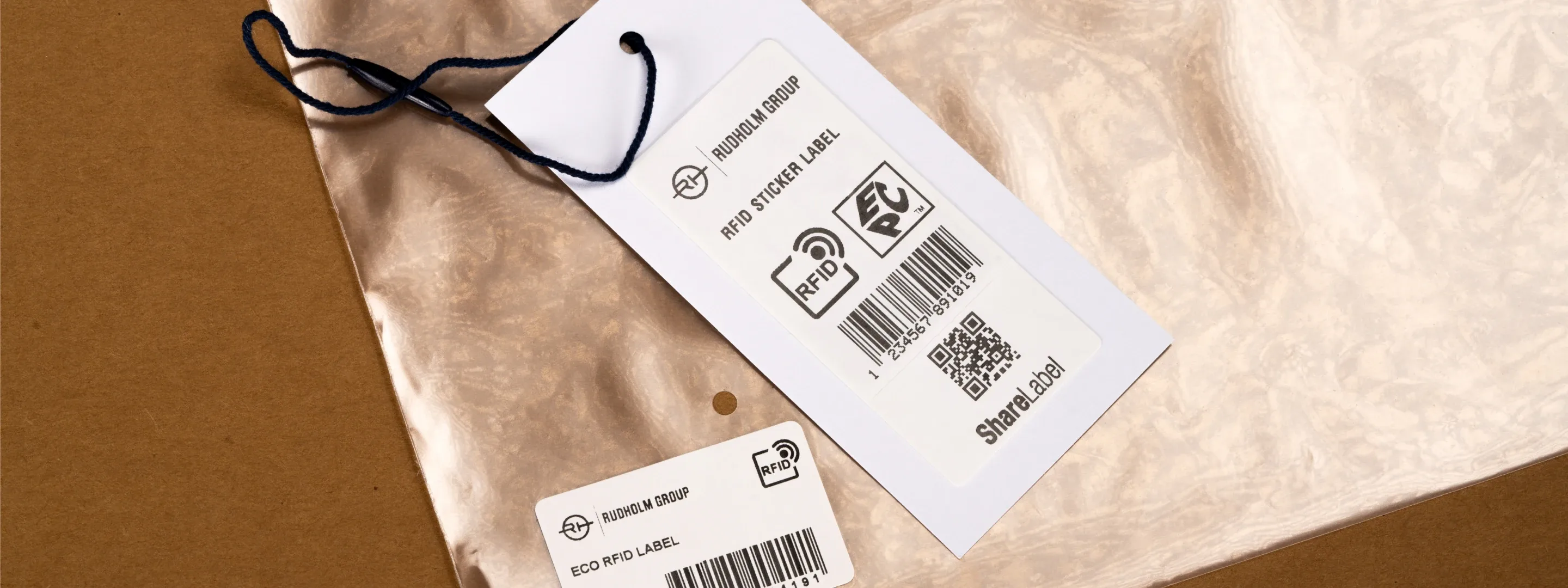 Rudholm Group hang tags and labels on fabric